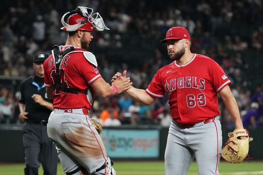 Angels' Logan O’Hoppe (left) and Chase Silseth (right) react after a win Angels' Logan O’Hoppe (left) and Chase Silseth (right) react after a win