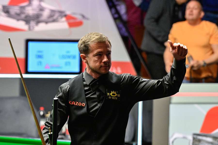 Lisowski held his nerve to win a final-frame decider