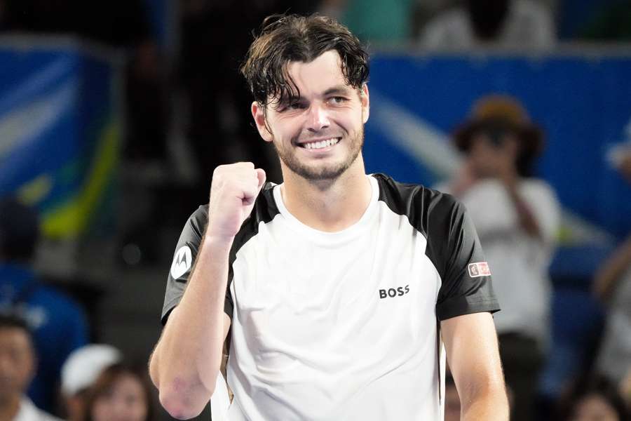 Taylor Fritz celebrates winning against Nuno Borges in Tokyo