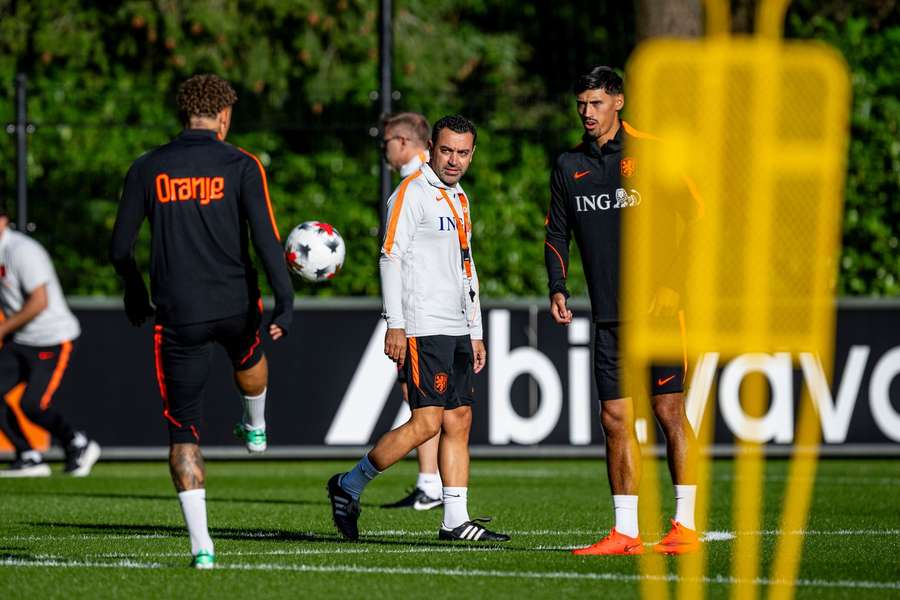 Netherlands head coach Xavi Hernandez watches on during training Netherlands head coach Xavi Hernandez watches on during training