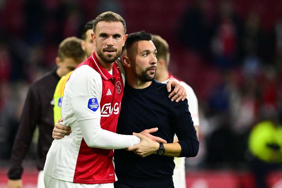 Ajax manager Francesco Farioli (R) would like to keep captain Jordan Henderson around
