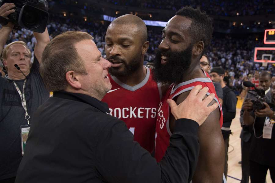 Houston Rockets owner Tilman Fertitta (left) celebrates with PJ Tucker and James Harden in 2017