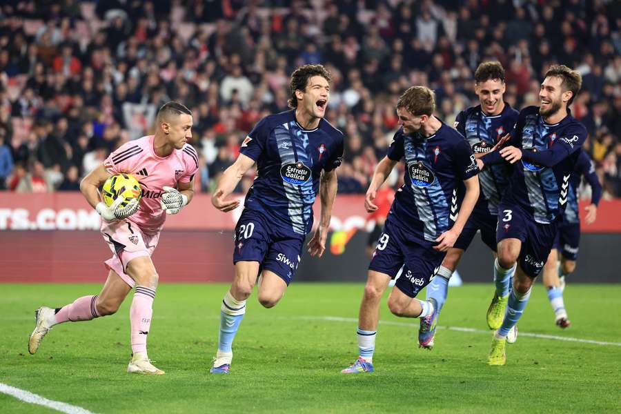 Marcos Alonso celebrates his winner
