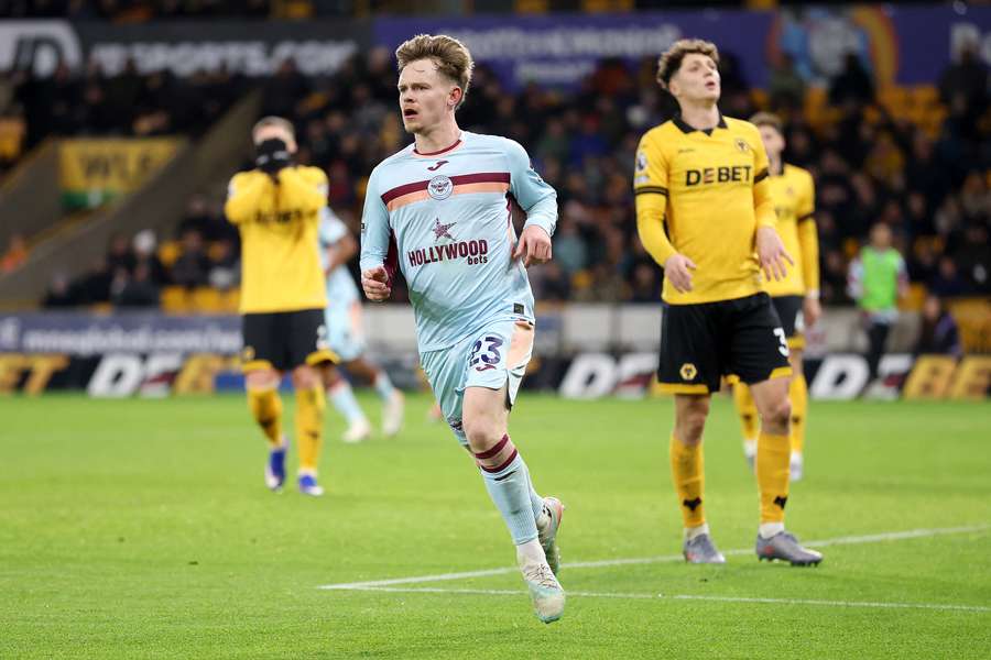 Keane Lewis-Potter celebrates scoring the winning goal just after the hour