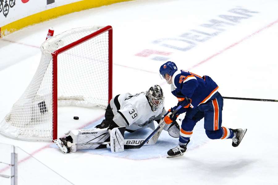 New York Islanders centre Jean-Gabriel Pageau scores the game-winning goal in overtime against Los Angeles Kings