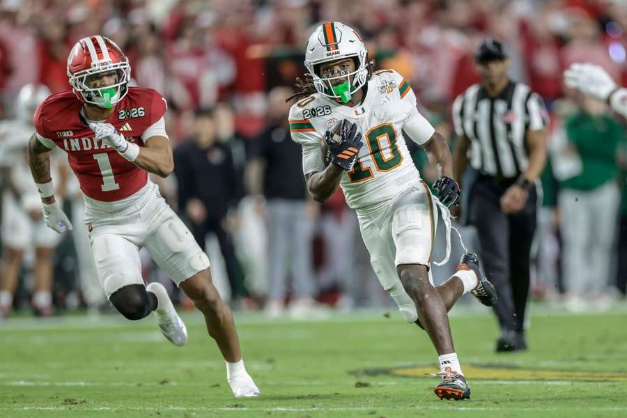 Miami's Malachi Toney runs the ball for a touchdown in the national championship game against Indiana Miami's Malachi Toney runs the ball for a touchdown in the national championship game against Indiana