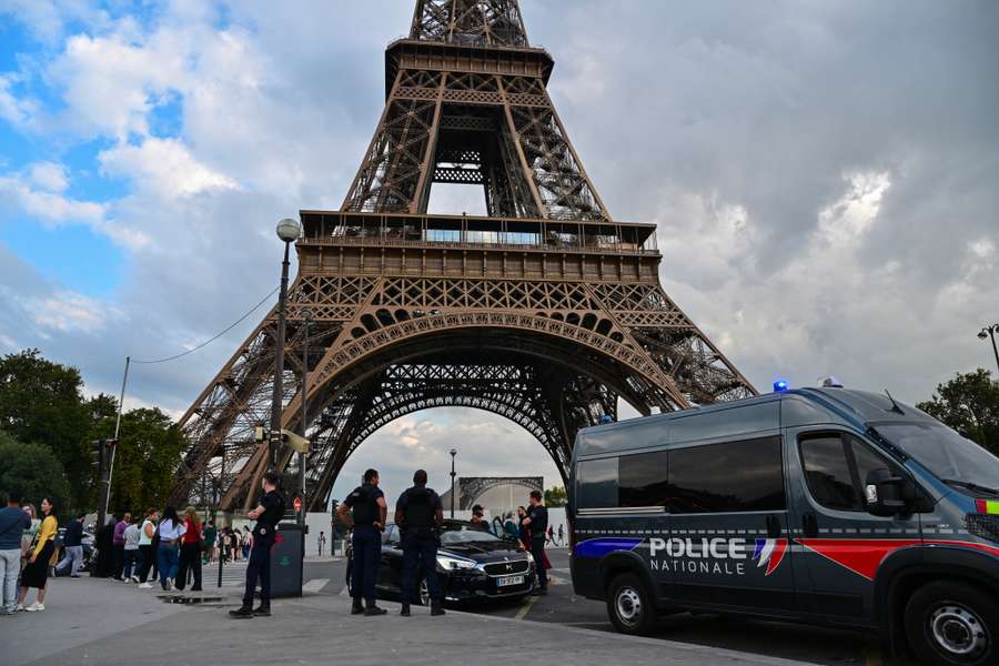Police patrol around the Eiffel Tower
