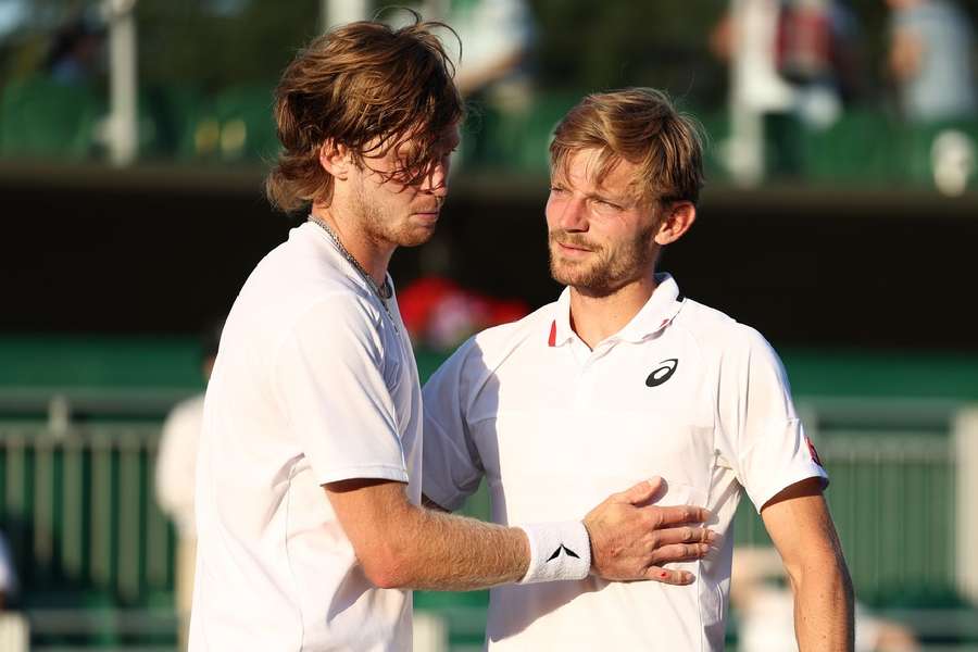 Rublev and Goffin embrace at the net