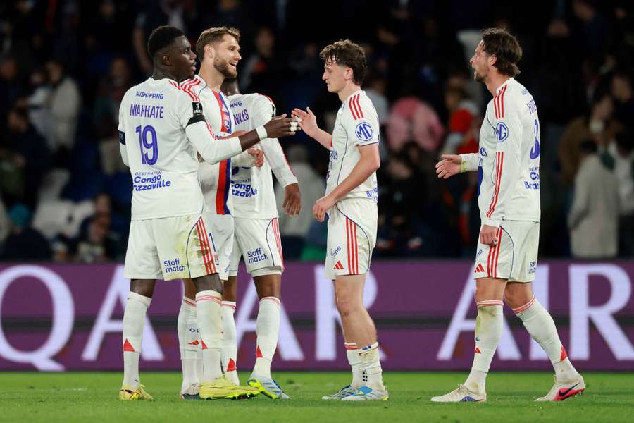 Jogadores do Lyon em ação Jogadores do Lyon em ação