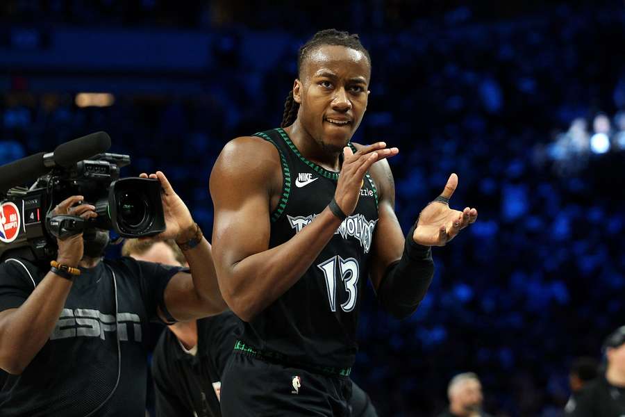 Ayo Dosunmu of the Minnesota Timberwolves celebrates