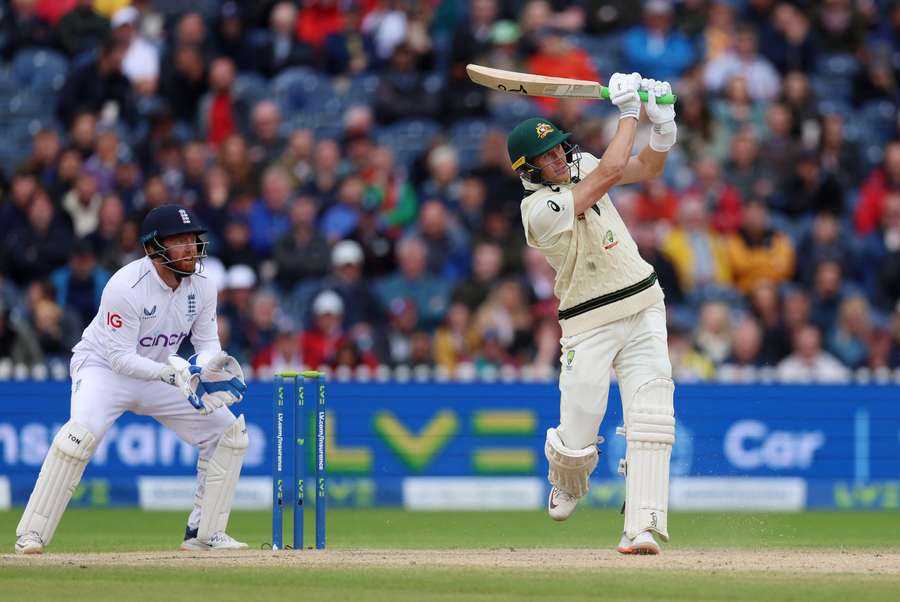 Australia's Marnus Labuschagne in action as England's Jonny Bairstow looks on