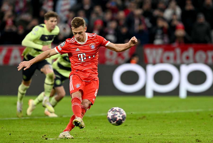 Bayern Munich's German midfielder Joshua Kimmich scores from the penalty spot Bayern Munich's German midfielder Joshua Kimmich scores from the penalty spot
