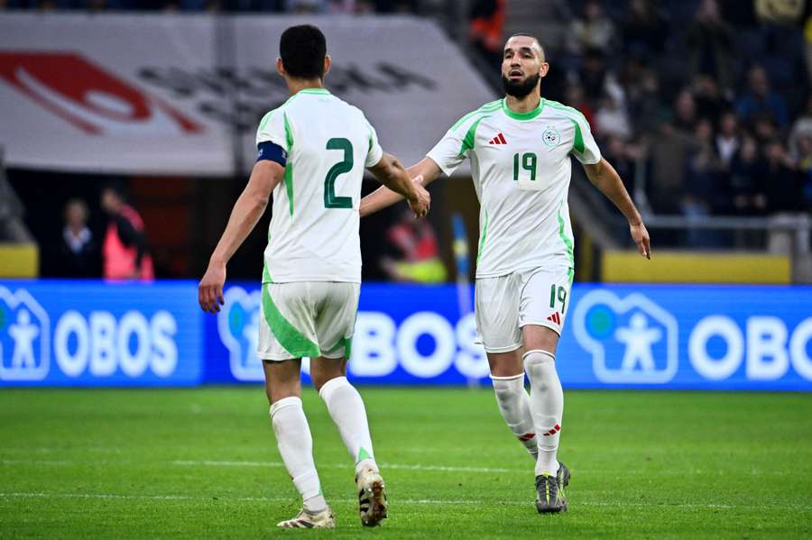 Nabil Bentaleb, right, representing Algeria back in 2025
