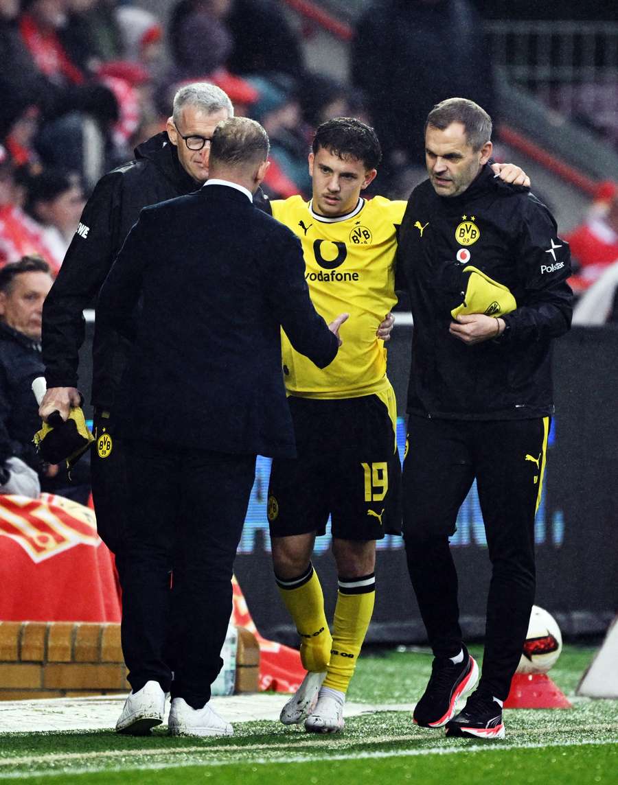 Konstantinos Karetsas as he is helped after sustaining an injury Konstantinos Karetsas as he is helped after sustaining an injury