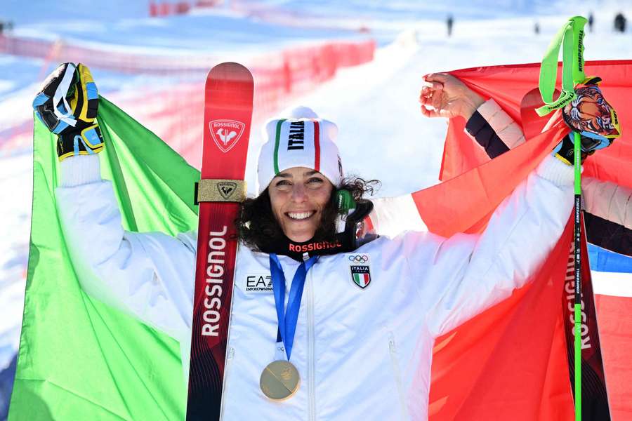 Brignoneová oslavuje zisk olympijského zlata. Brignoneová oslavuje zisk olympijského zlata.