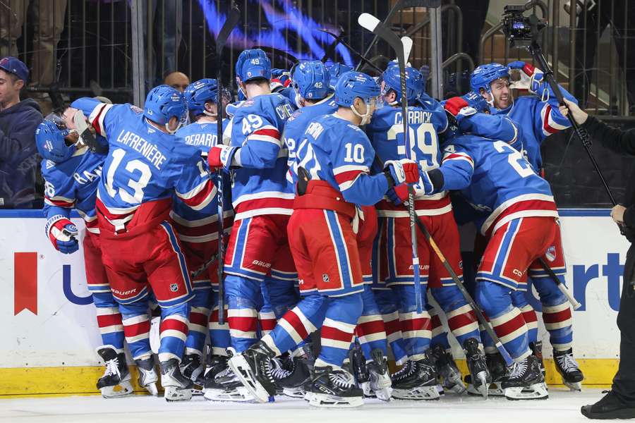 The New York Rangers celebrate completing a remarkable comeback in the NHL on Saturday. The New York Rangers celebrate completing a remarkable comeback in the NHL on Saturday.