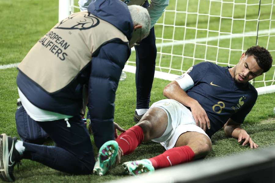 Warren Zaire-Emery received treatment after suffering an ankle injury against Gibraltar