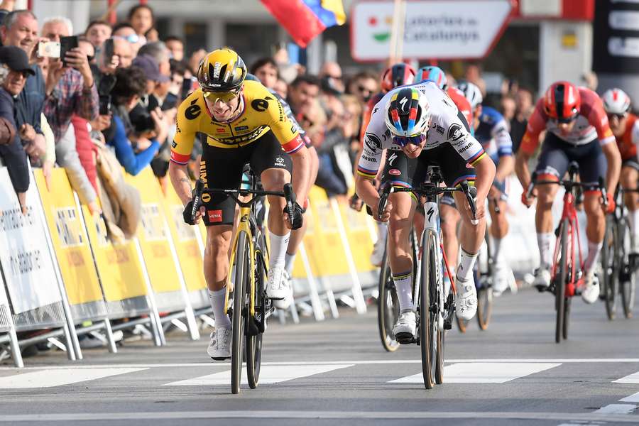 Team Jumbo's Slovenian rider Primoz Roglic (L) ahead of Quick-Step Belgian rider Remco Evenepoel