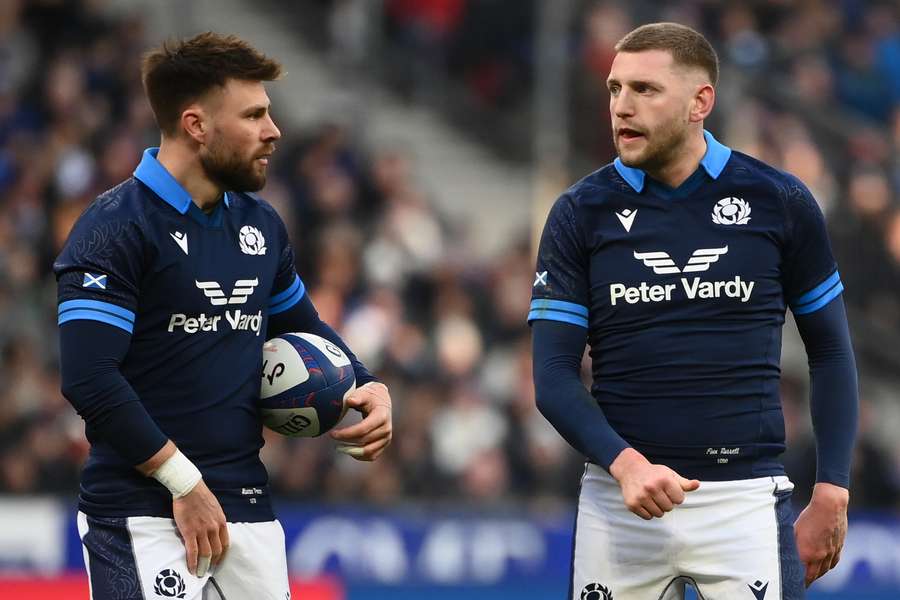 Scotland's Ali Price and Scotland's scrum-half Finn Russell react during the Six Nations