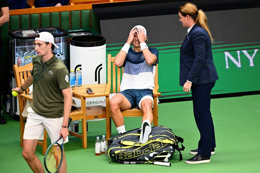 Holger Rune reacts after sustaining his injury in the semi-final of the Stockholm Open against Ugo Humbert Holger Rune reacts after sustaining his injury in the semi-final of the Stockholm Open against Ugo Humbert