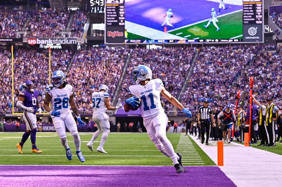 Kalif Raymond of the Detroit Lions scores a touchdown in the third quarter of a game against the Minnesota Vikings at US Bank Stadium