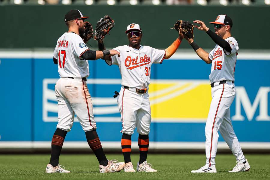 Orioles outfielders Colton Cowson (left), Cedric Mullins (center), and Dylan Carlson (right) celebrate win against Blue Jays (2025) Orioles outfielders Colton Cowson (left), Cedric Mullins (center), and Dylan Carlson (right) celebrate win against Blue Jays (2025)