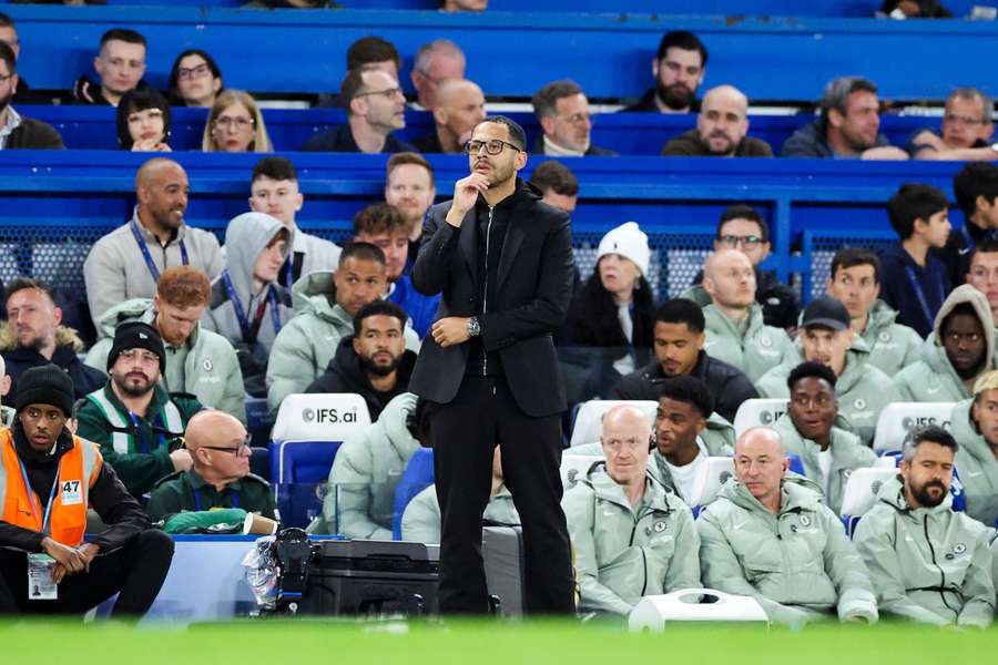 Chelsea's first-team head coach, Liam Rosenior, watches on