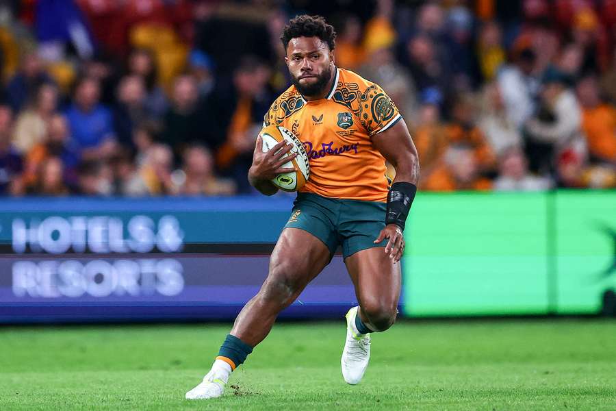 Australia's Filipo Daugunu runs with the ball against France. Australia's Filipo Daugunu runs with the ball against France.