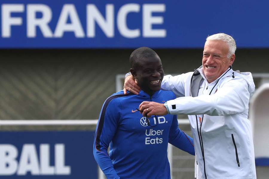 France's N'Golo Kante and coach Didier Deschamps during training