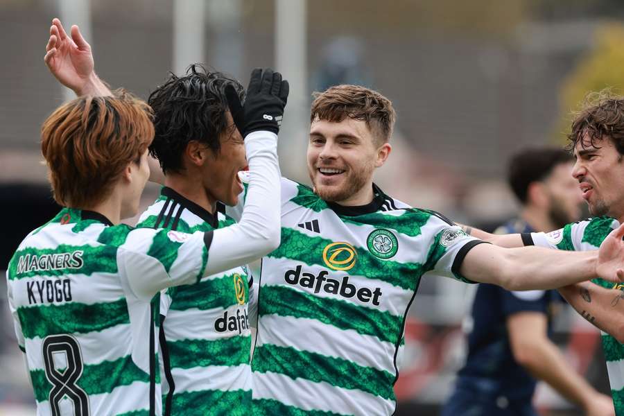 Celtic's James Forrest celebrates scoring their side's first goal
