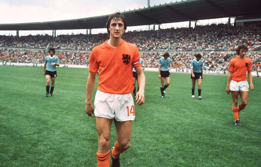 The Netherlands' Johan Cruyff walks off the pitch after the 1974 FIFA World Cup match against Uruguay