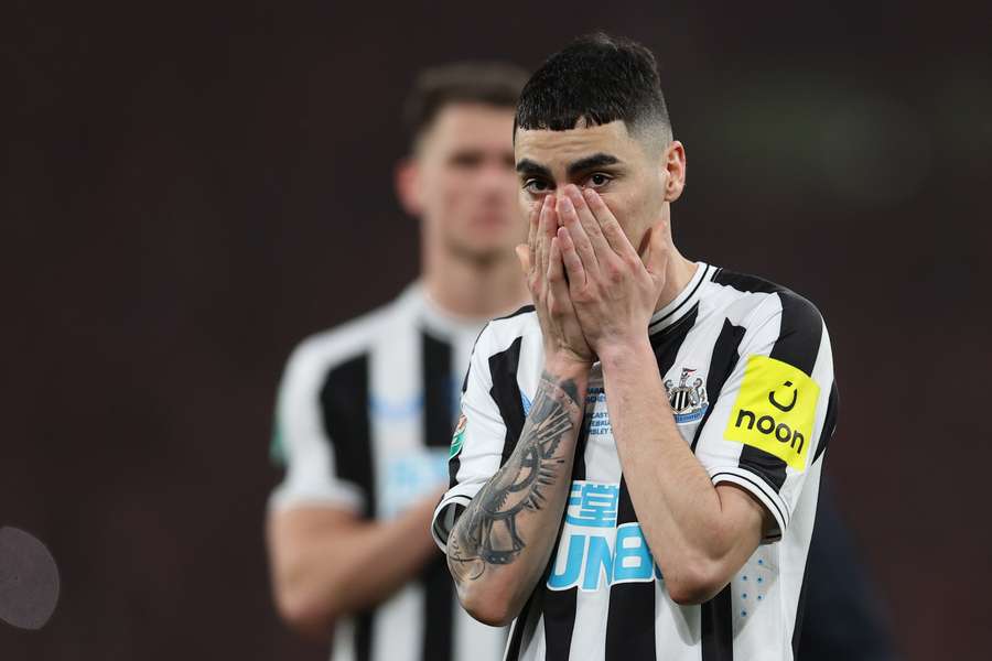 Newcastle United's Paraguayan midfielder Miguel Almiron reacts to their defeat on the pitch after the English League Cup final