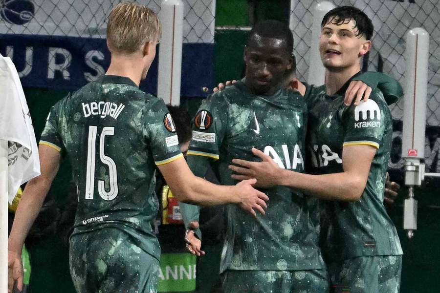 Pape Matar Sarr celebrates with teammates after giving Tottenham the lead in Budapest