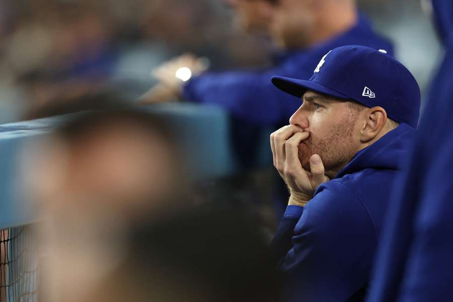 Freddie Freeman watching on from the dugout during a game against the Atlanta Braves
