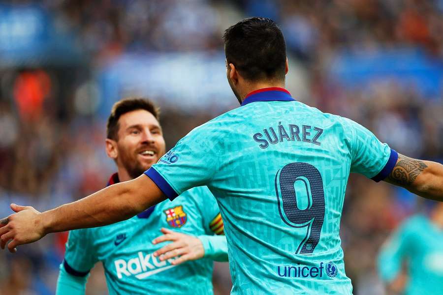 Lionel Messi (i.) y Luis Suárez (d.) durante su etapa juntos en el FC Barcelona.