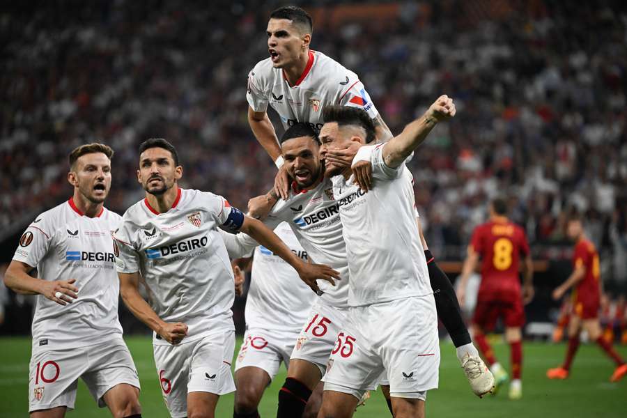 Sevilla players celebrate their equaliser