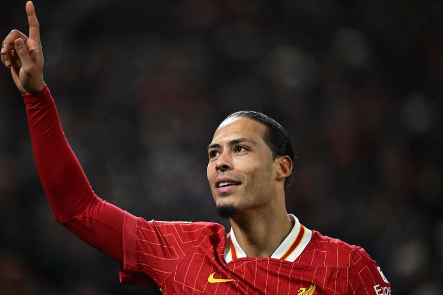 Liverpool's Virgil van Dijk celebrates scoring in the Carabao Cup semi-final