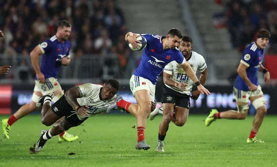 France's Thomas Ramos in action with Fiji's Josua Tuisova France's Thomas Ramos in action with Fiji's Josua Tuisova