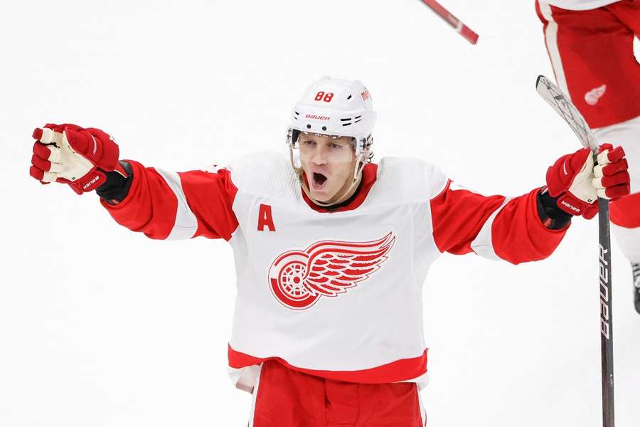 Detroit Red Wings right wing Patrick Kane celebrates after scoring game-winning goal against the Chicago Blackhawks in overtime