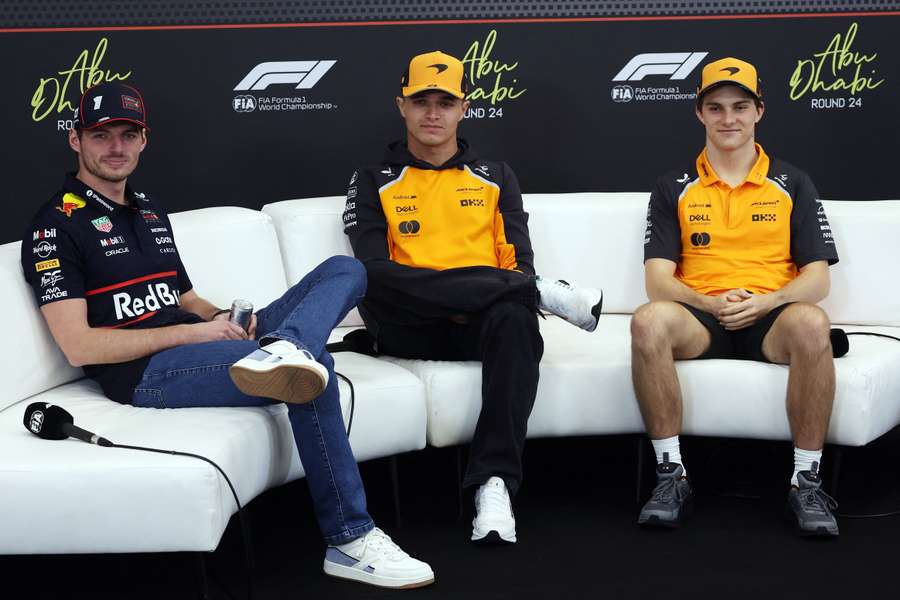 Red Bull's Max Verstappen, McLaren's Lando Norris and McLaren's Oscar Piastri during a press conference ahead of Abu Dhabi Grand Prix