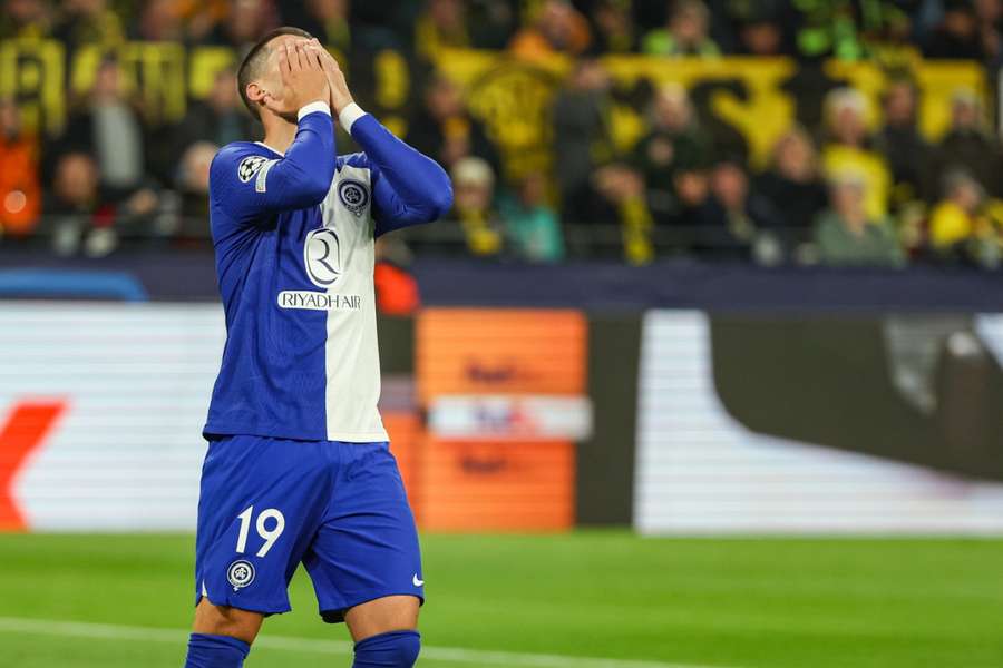 Álvaro Morata lamenta a oportunidade perdida contra o Borussia Dortmund