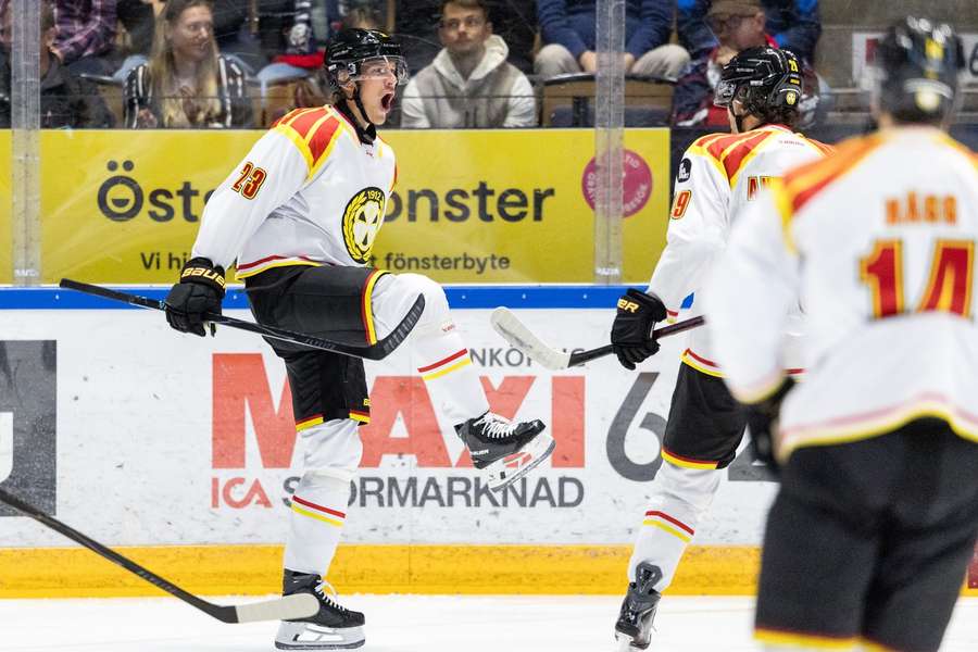 Oskar Lindblom (left) celebrates the first of his two goals for Brynas