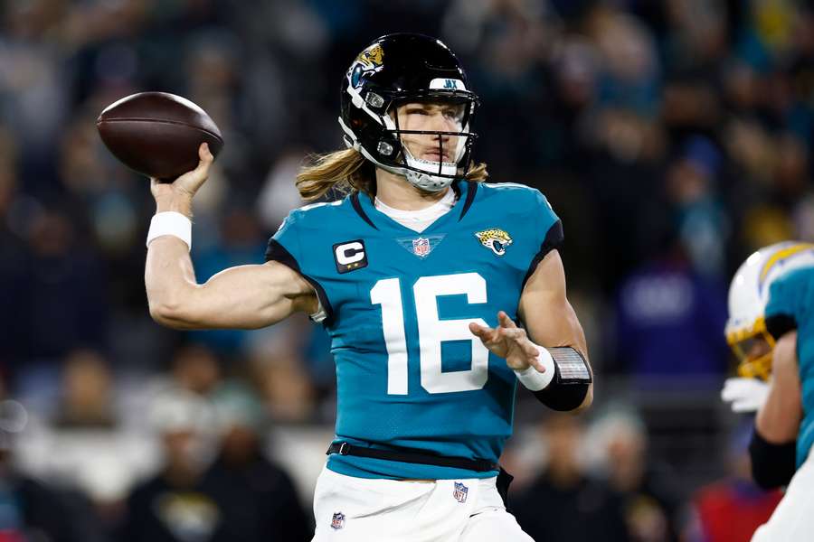 Trevor Lawrence #16 of the Jacksonville Jaguars throws a pass against the Los Angeles Chargers during the second half of the game 