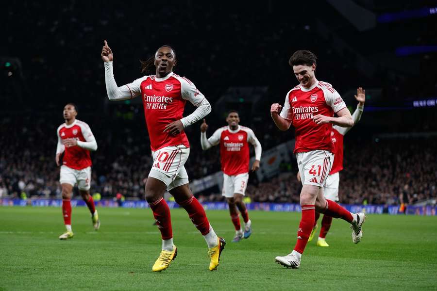 Eze (L) celebrates against Tottenham