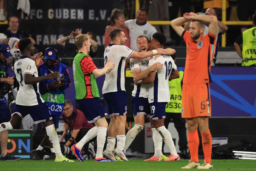 Harry Kane reacts to the final whistle against the Netherlands with Ollie Watkins