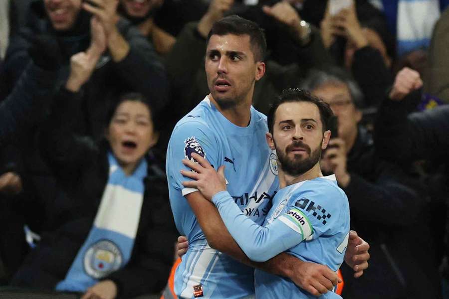 Rodri (centre) celebrates scoring for Man City