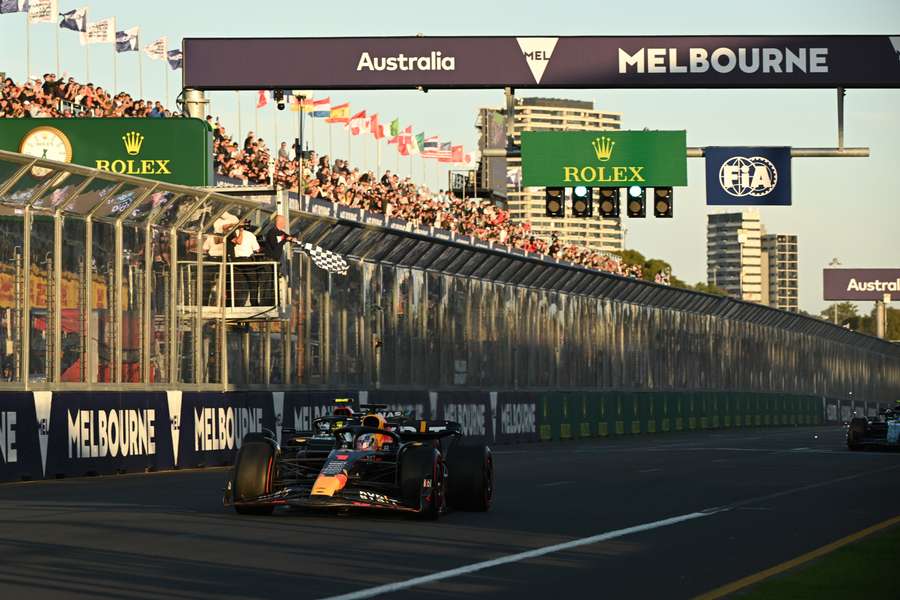 Red Bull Racing's Dutch driver Max Verstappen crosses the chequered flag