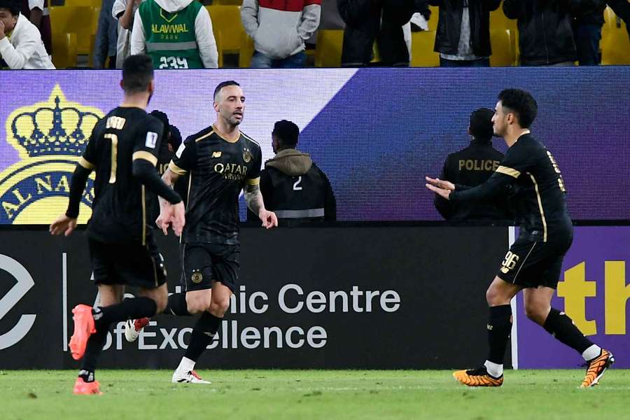Al Sadd's Adam Ounas celebrates scoring their second goal against Al Nassr