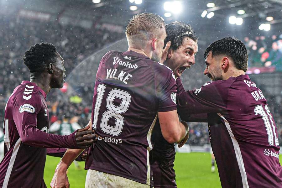 Magnusson (middle right) celebrates his late winner