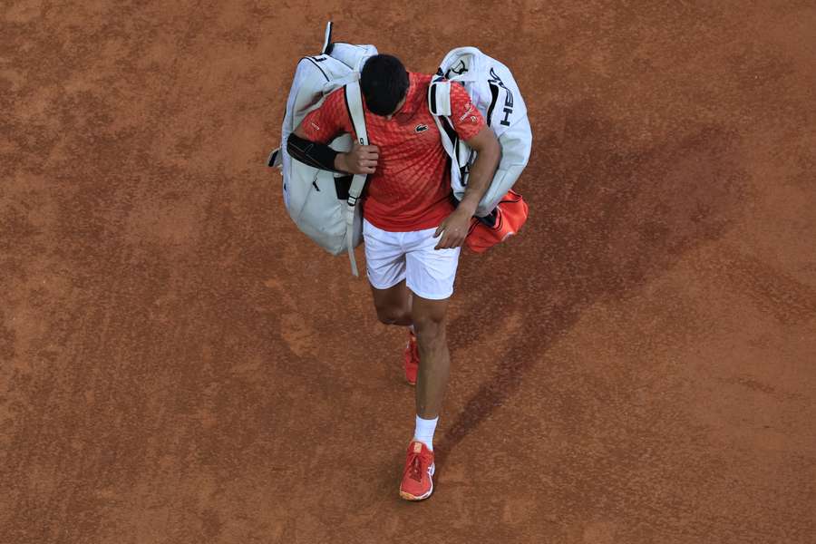 Serbia's Novak Djokovic leaves the court after losing against Italy's Lorenzo Musetti after their Monte-Carlo ATP Masters Series round of 16 tennis match